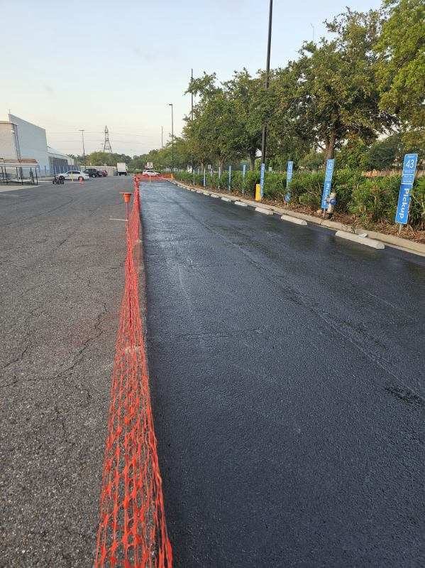 Freshly seal-coated asphalt pavement surface